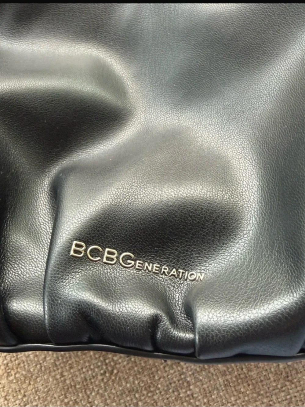 BCBGeneration faux-leather ruched hobo handbag.